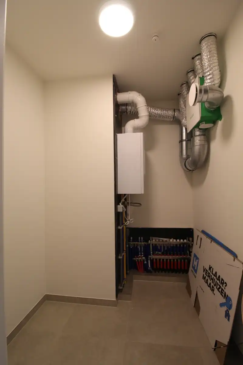 Gelijkvloers nieuwbouw appartement met zonnige tuin te Gent foto 9