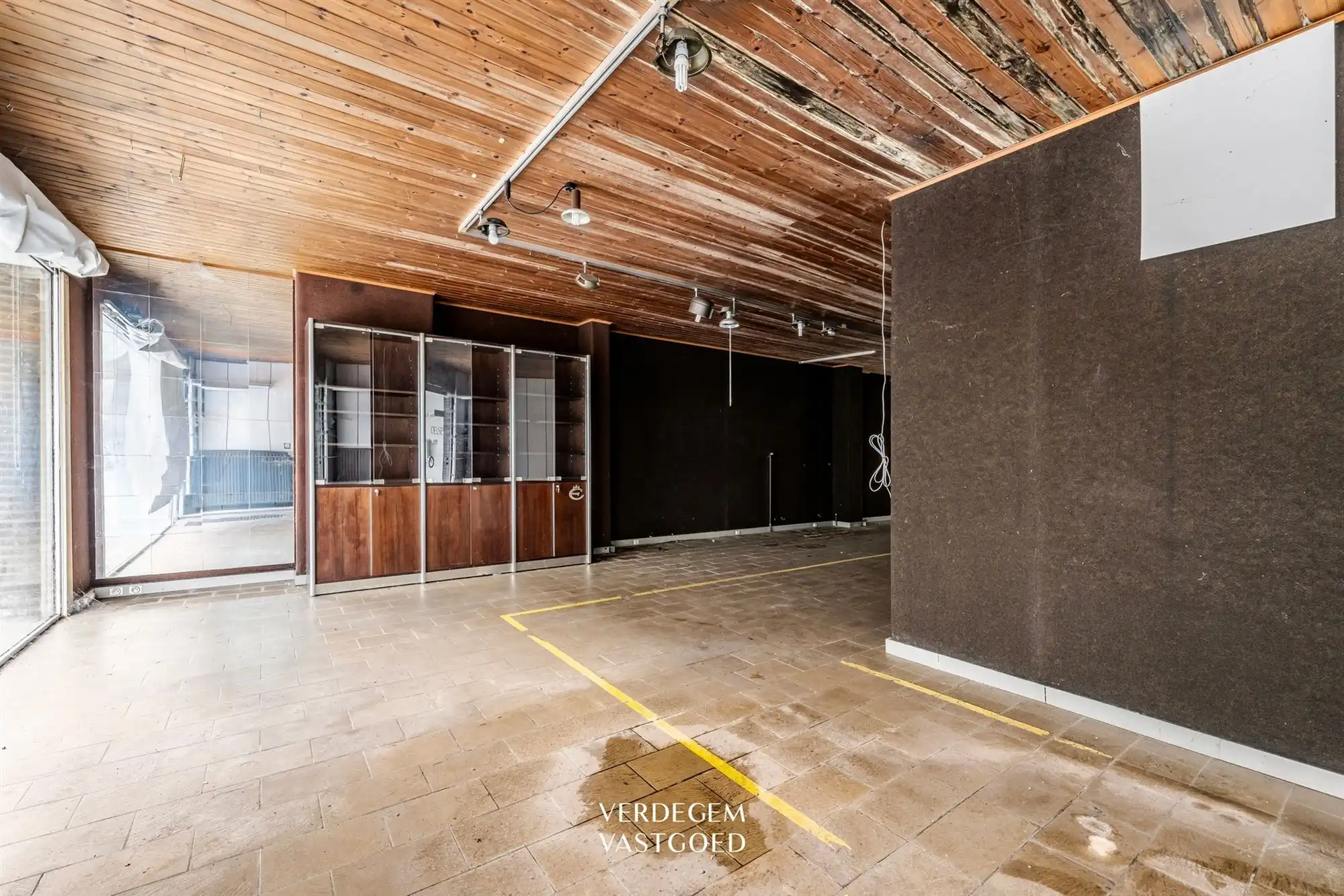Renovatieproject: centraal gelegen handelspand met woonst en tuin foto 5