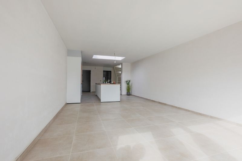 Volledig vernieuwde  woning op een boogscheut van "de Gavers" met 3 slaapkamers, ingerichte keuken, tuin met uitweg (garagemogelijkheid). Energielabel A foto 8