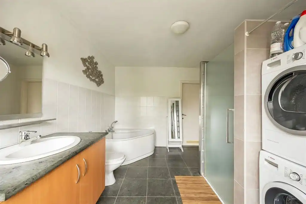 Charmante halfopen woning met grote tuin te Turnhout foto 23