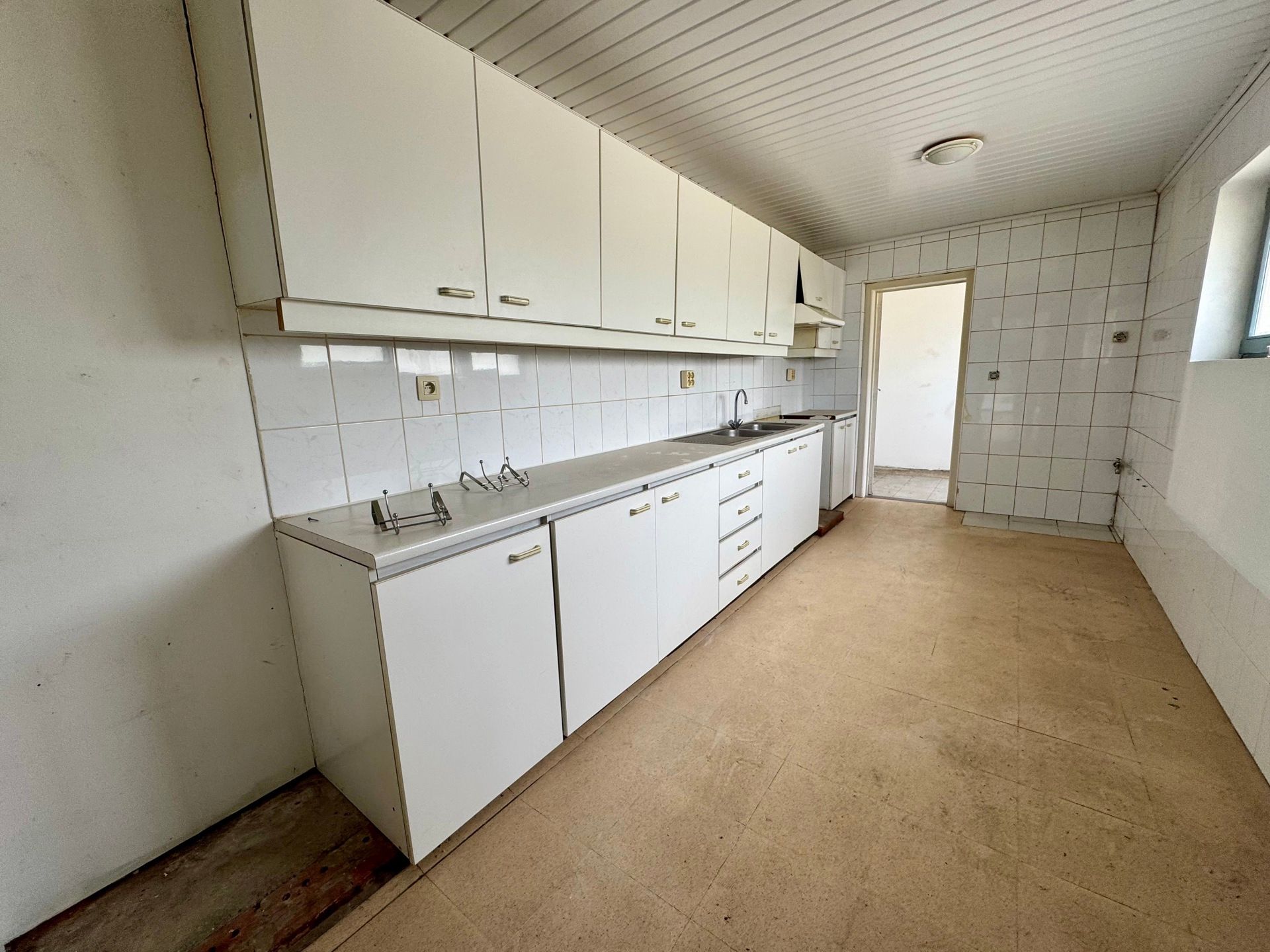 Handelspand met duplex-appartement te Langdorp foto 12