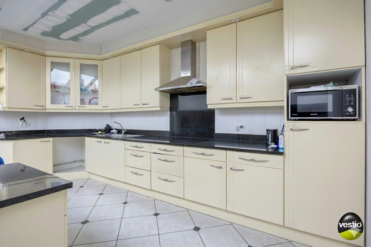 HANDELSPAND MET WOONST TE HOESELT NABIJ CENTRUM EN E313. foto 21