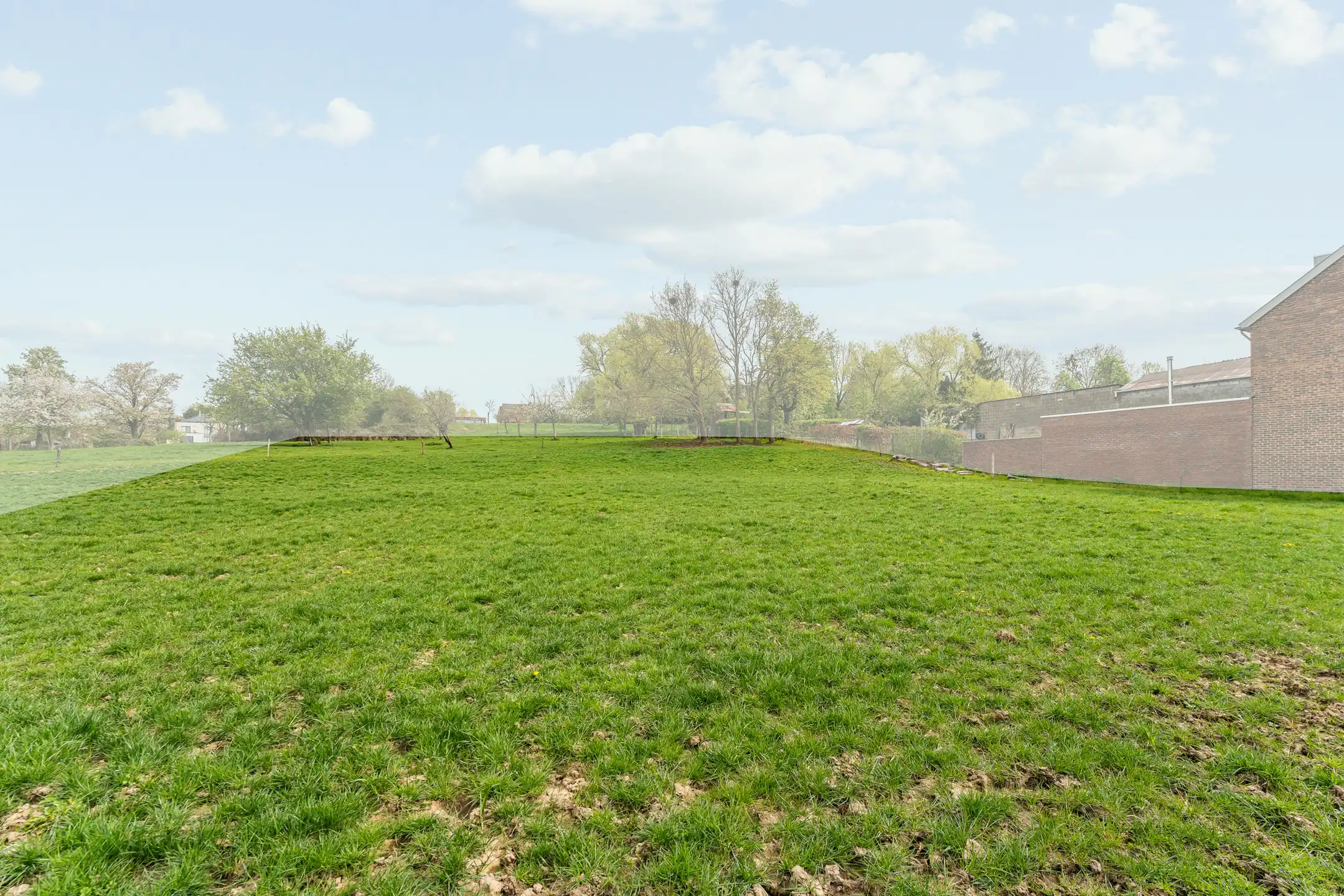 Riante bouwgrond 12a61ca te Kleine Spouwen foto 3