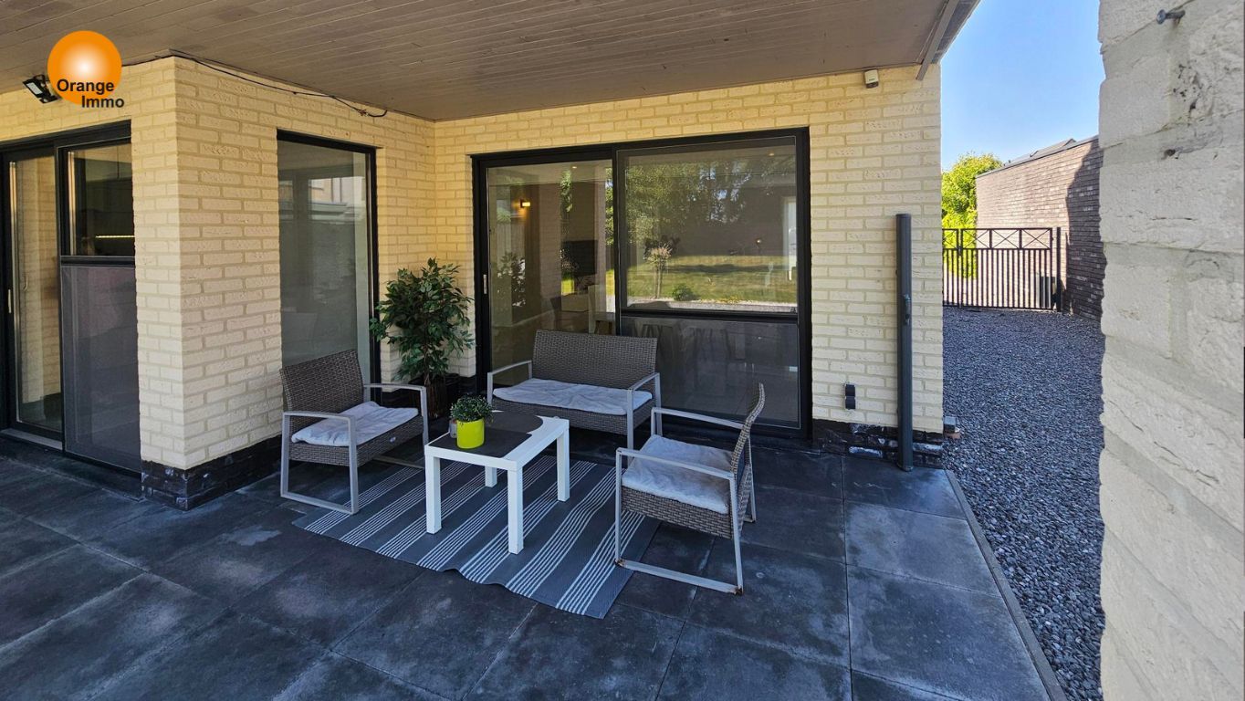 Knappe moderne woning met een mooie tuin  in Dilsen-Stokkem. foto 9