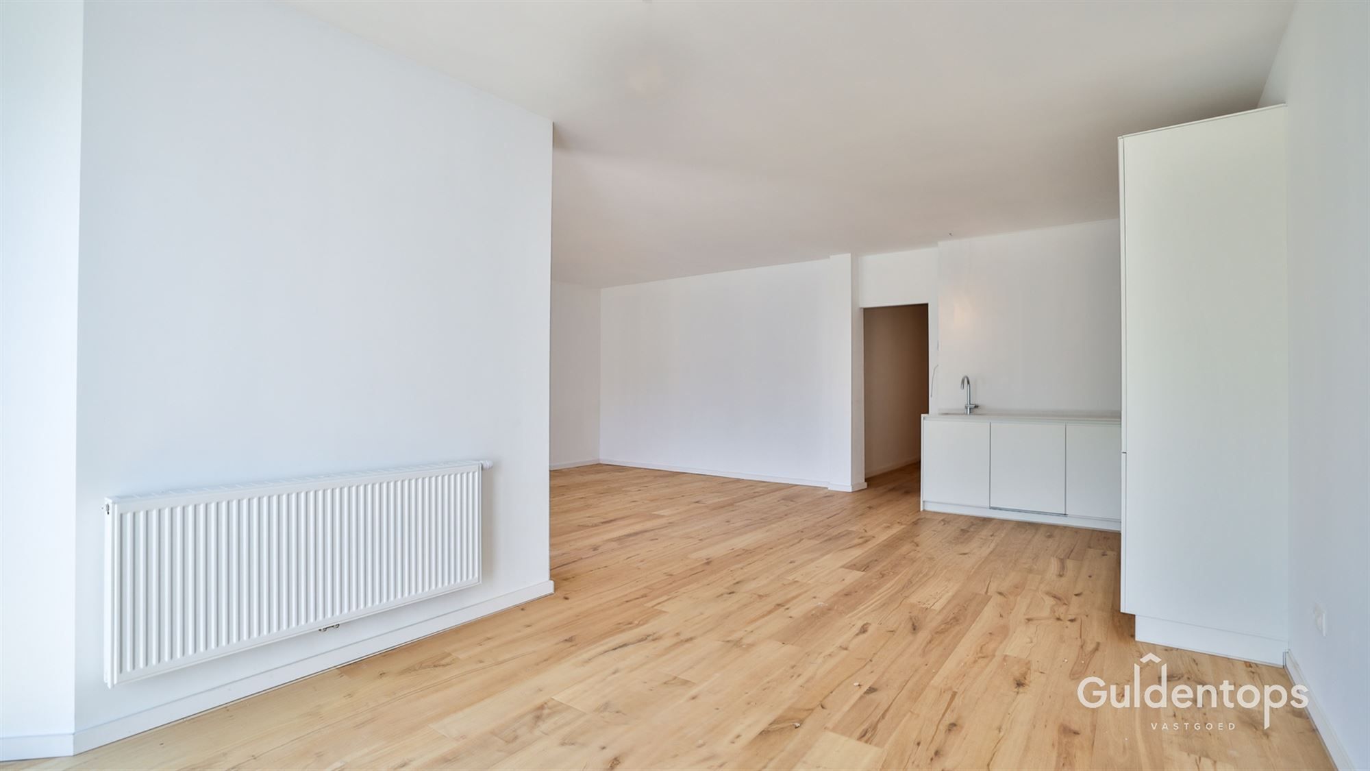 Knap gelijkvloers appartement in hartje Lier met grote tuin foto 12