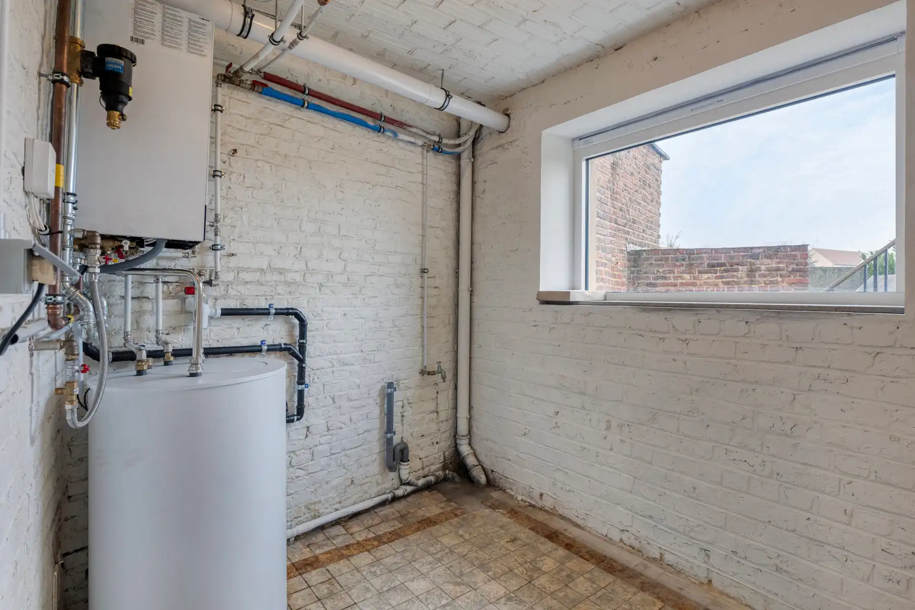 Instapklare woning met 3 slpk, garage en tuin! foto 19