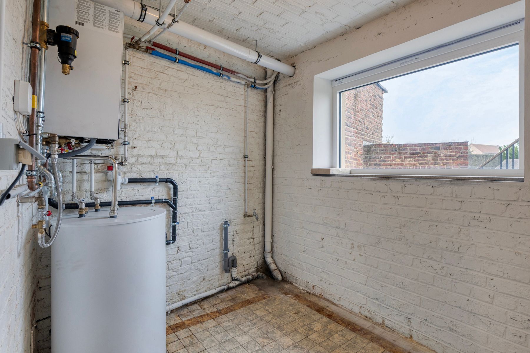 Instapklare woning met 3 slpk, garage en tuin! foto 19