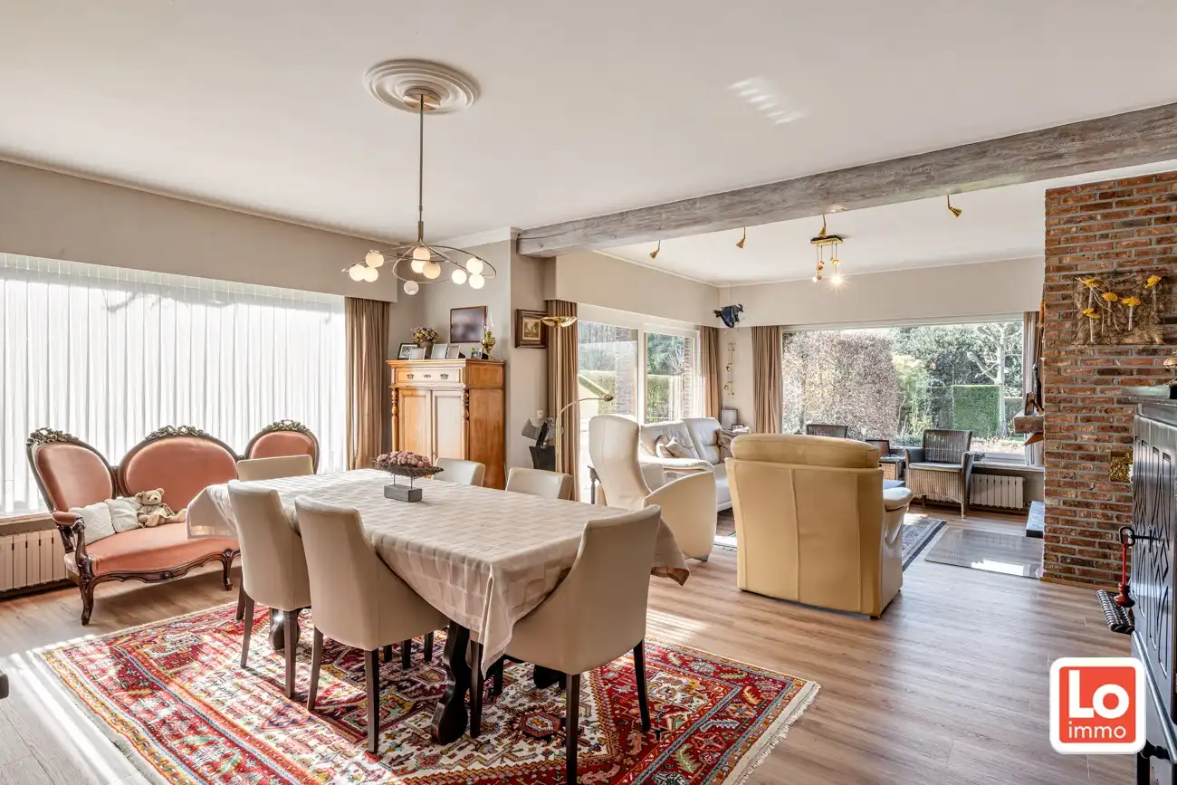 Degelijke open gelijkvloerse woning met inpandige garage en grote tuin op een groene toplocatie in Beervelde! foto 10