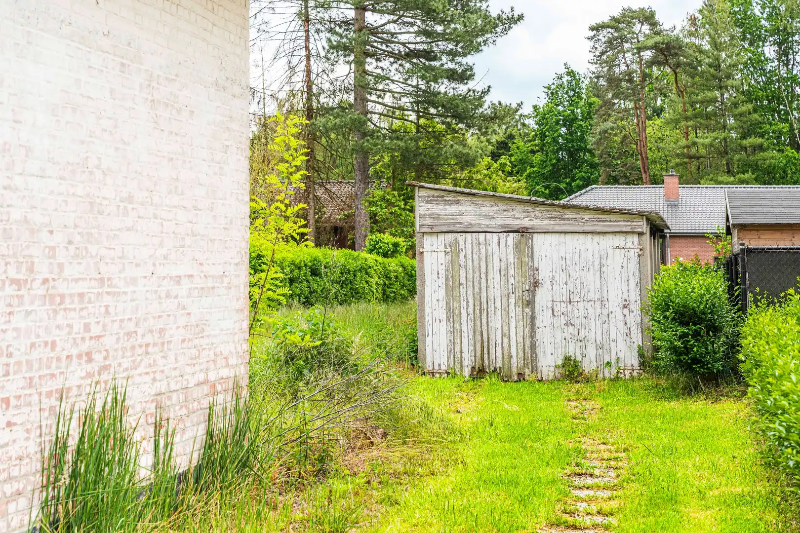 Unieke bouwgrond met vergunde renovatie of nieuwbouwmogelijkheid foto 7