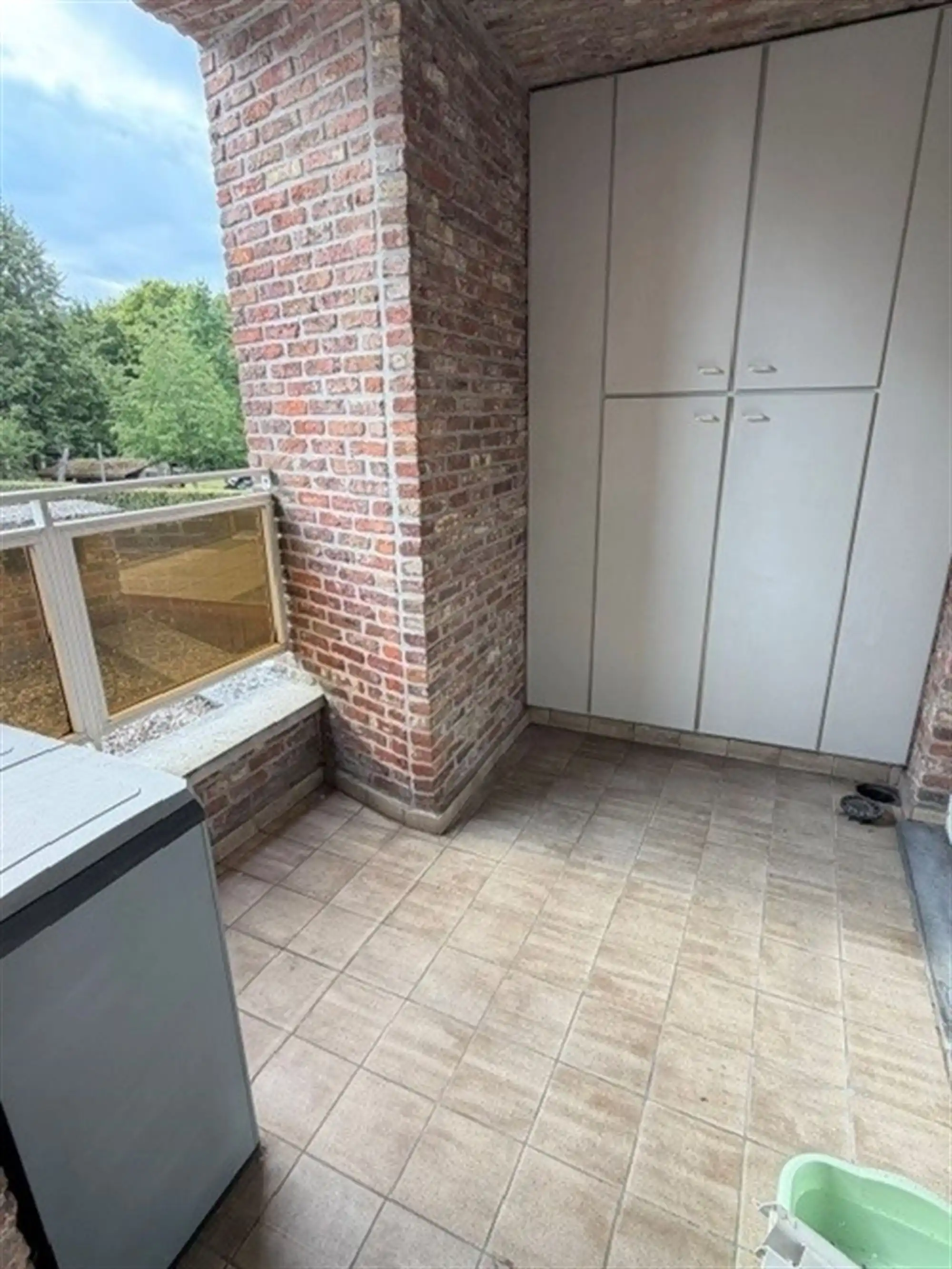 Lichtrijk appartement met terras en garagebox op een uitstekende locatie foto 2