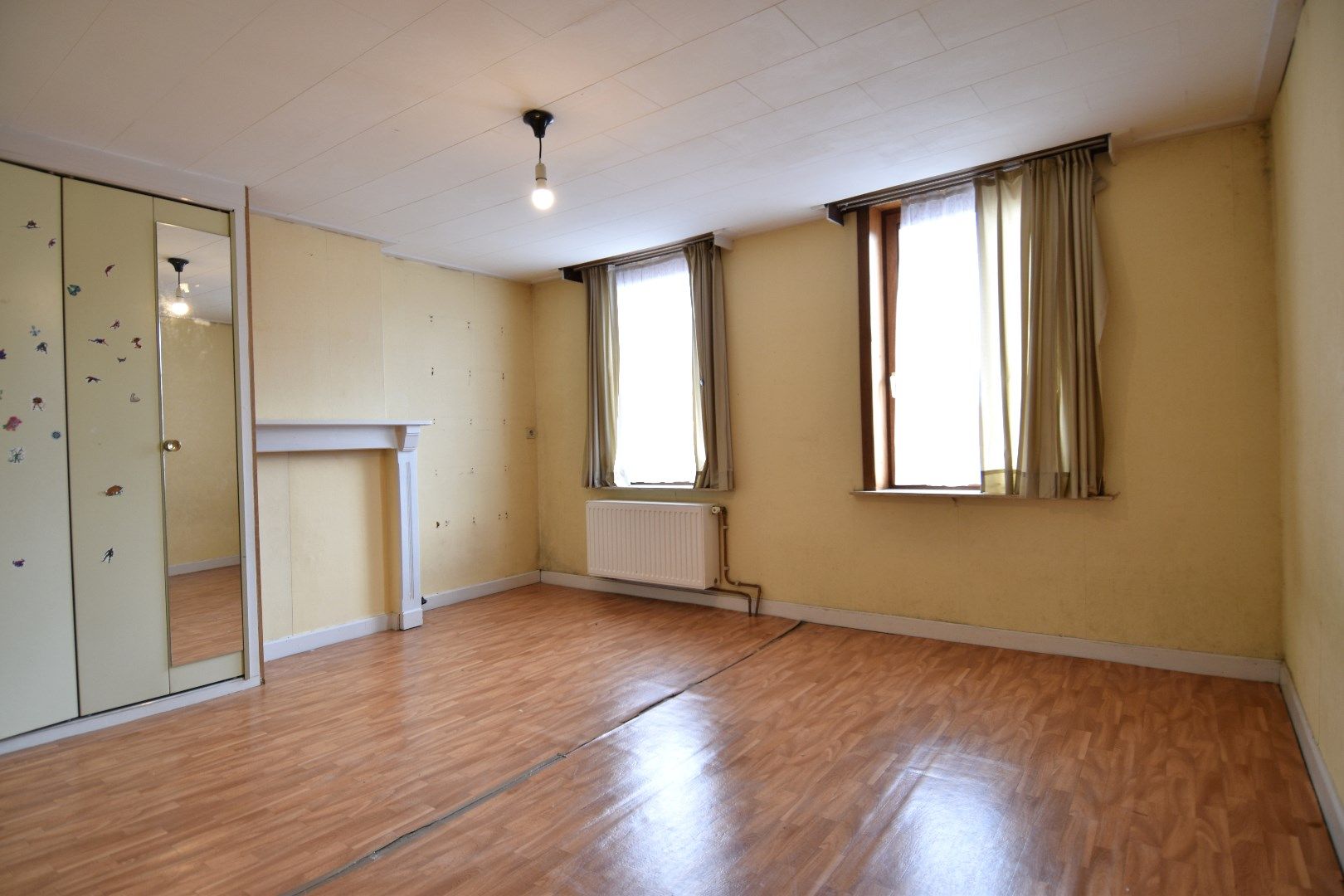 Ruime 3-slaapkamerwoning met bovenliggend appartement (woning) te koop in centrum-Kortrijk foto 7