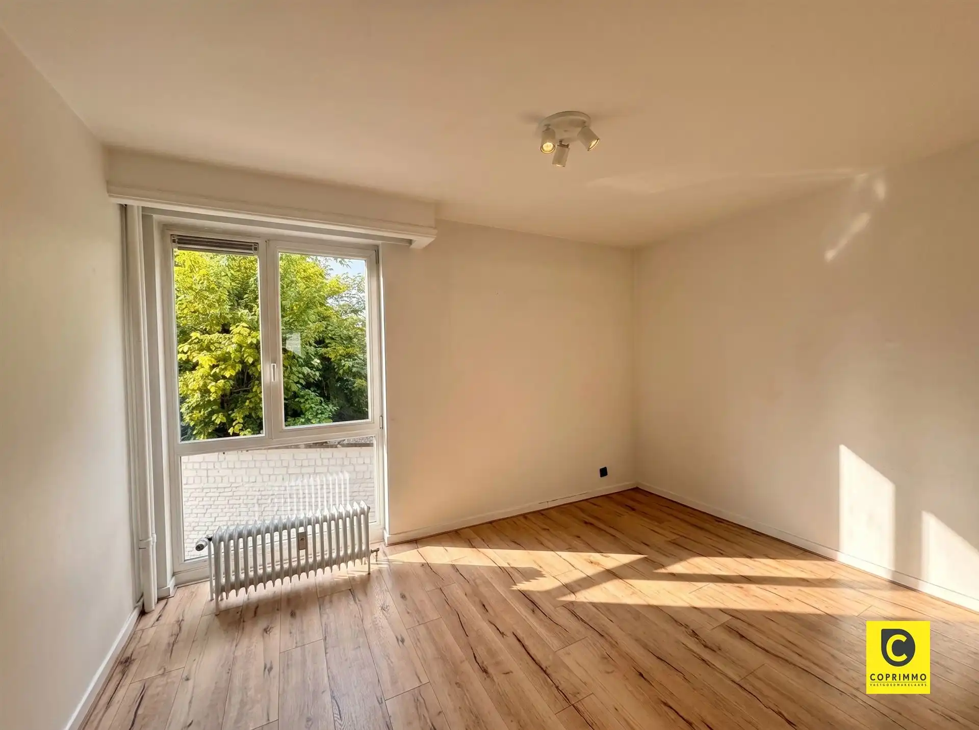Instapklaar 3 slaapkamer appartement met zonnig terras, kelder en fietsenberging foto 11