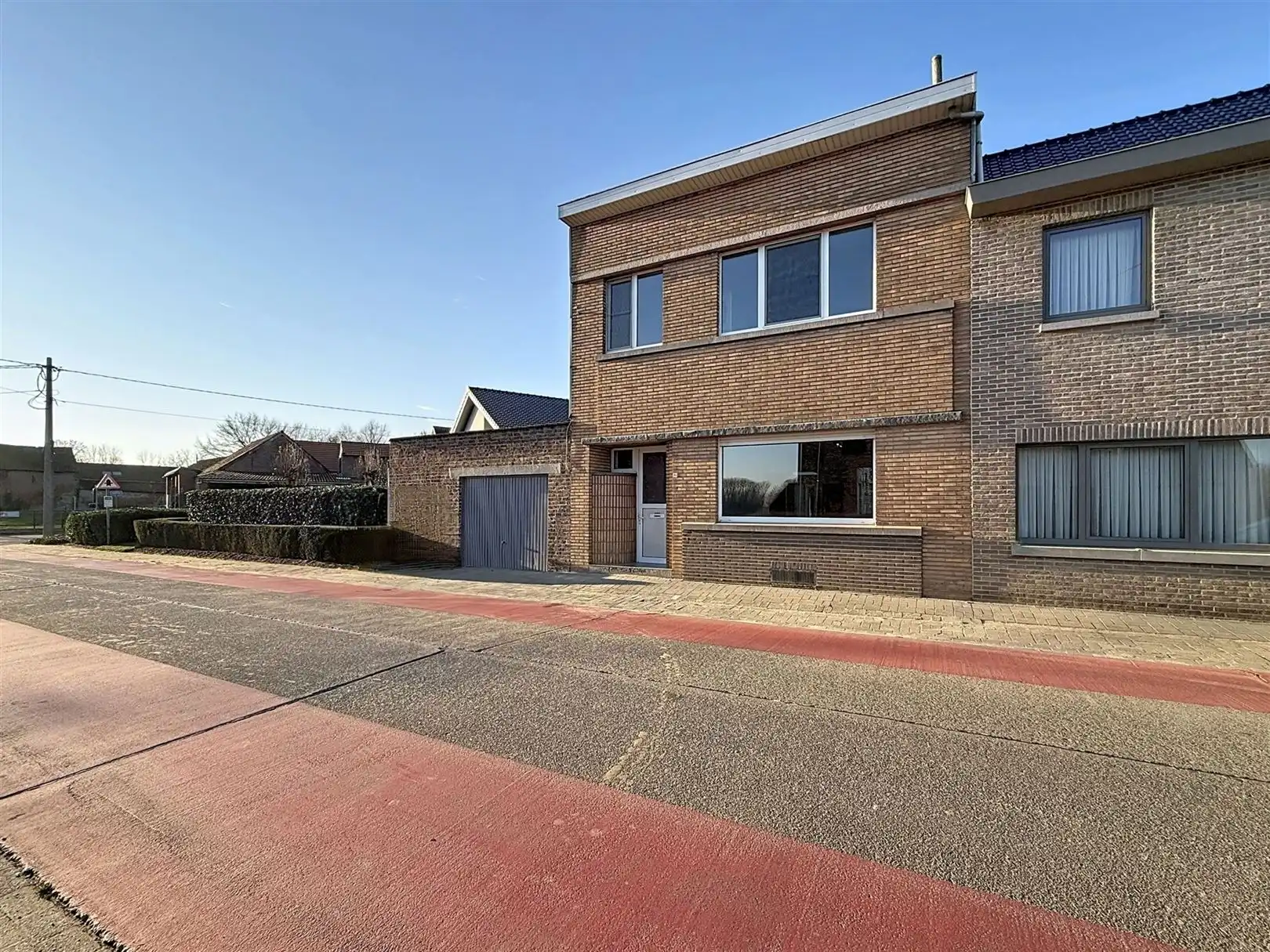 Halfopen bebouwing met 2 slpks, terras, garage foto 3