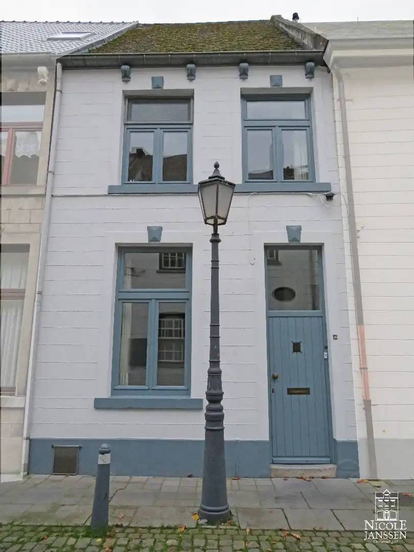 Charmant stadshuisje met drie slaapkamers en tuintje foto 19