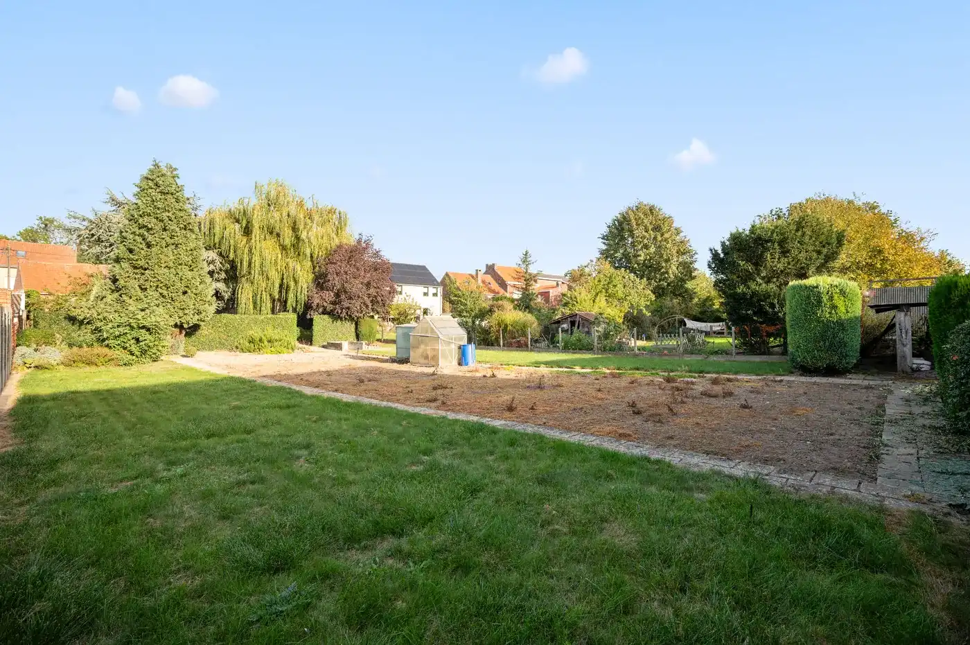 Charmante gezinswoning met ruime tuin en 3 garages in Overwinden (Landen) foto 25