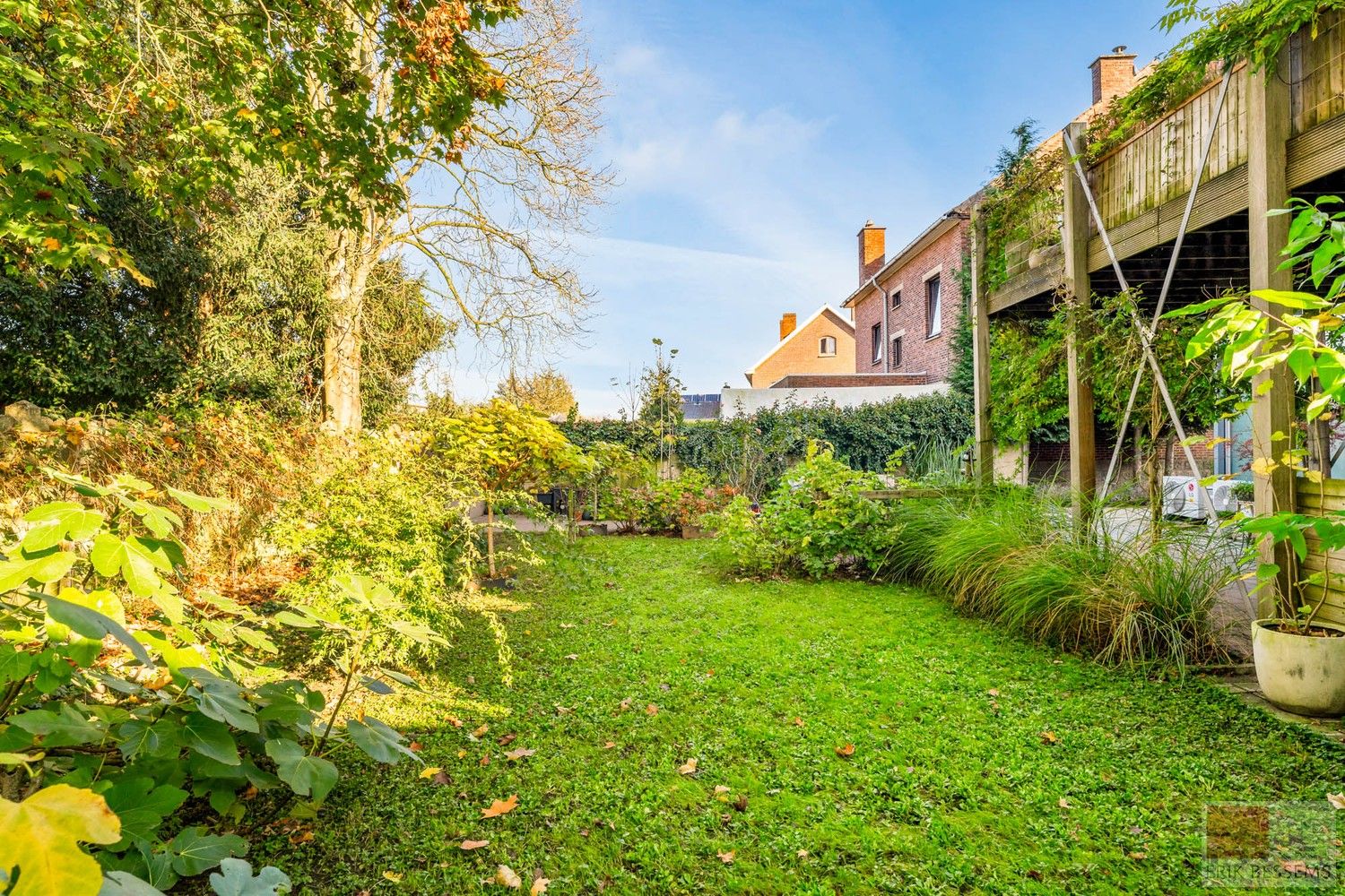 Architectenwoning met stalen constructie en glazen achtergevel foto 4