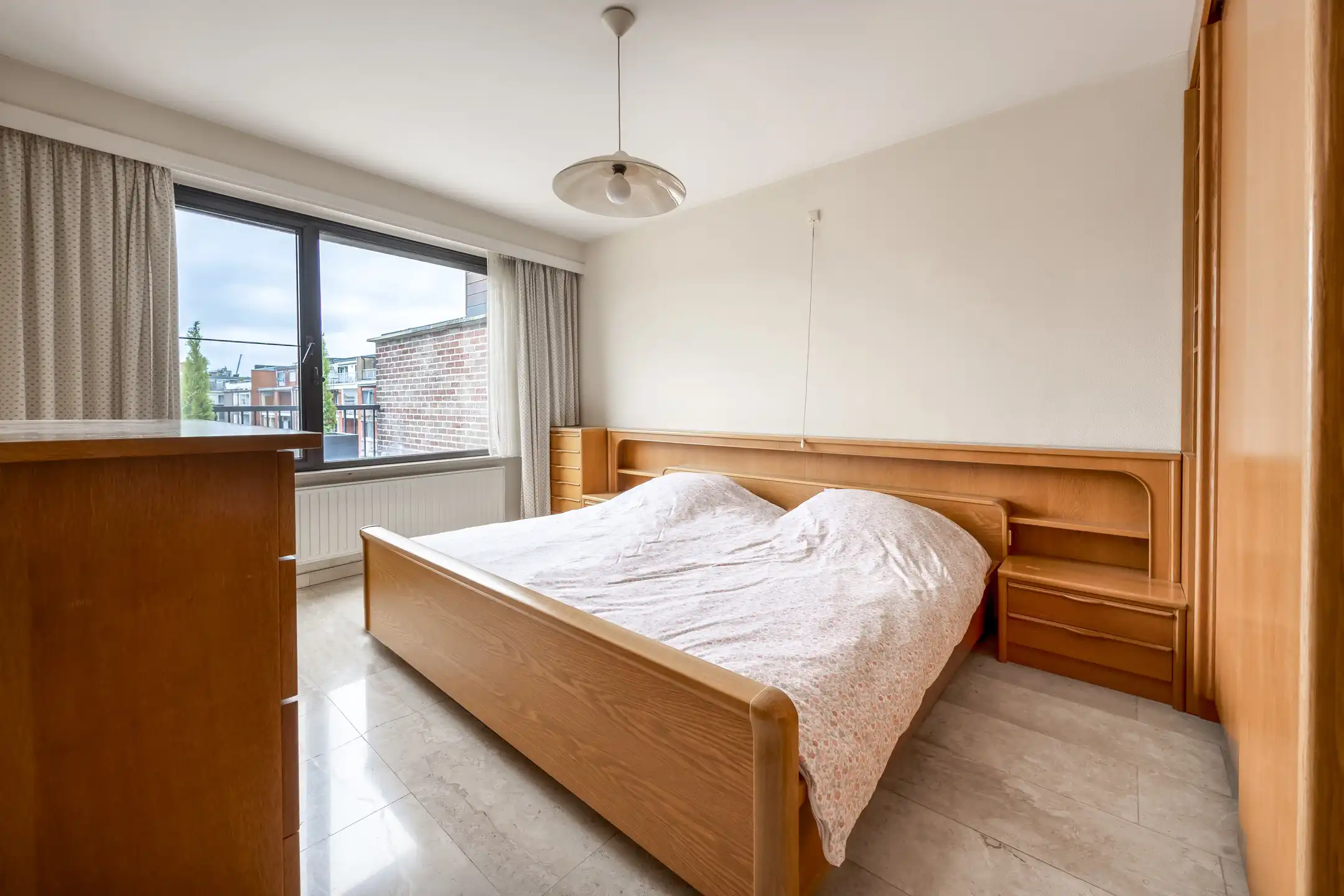 Goed gelegen dakappartement met groot terras voor en achter, 2 slpk en prachtig uitzicht foto 17