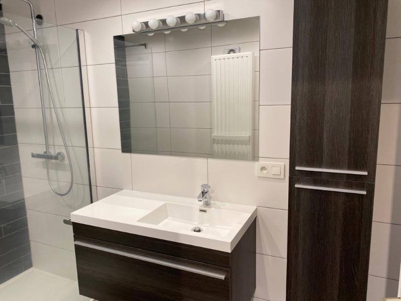 Ruim (±100m²) app met 2 slpk en autostaanplaats in hartje Geel foto 11