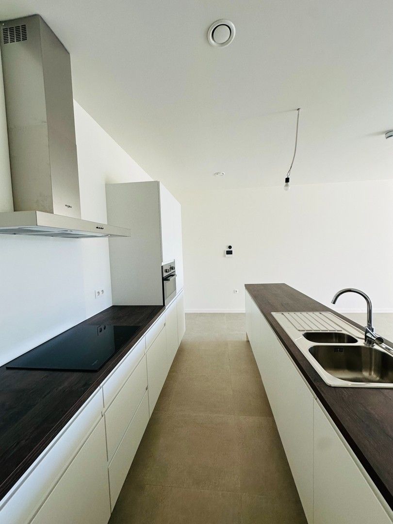 Nieuw gelijkvloers appartement met tuin en garage foto 11