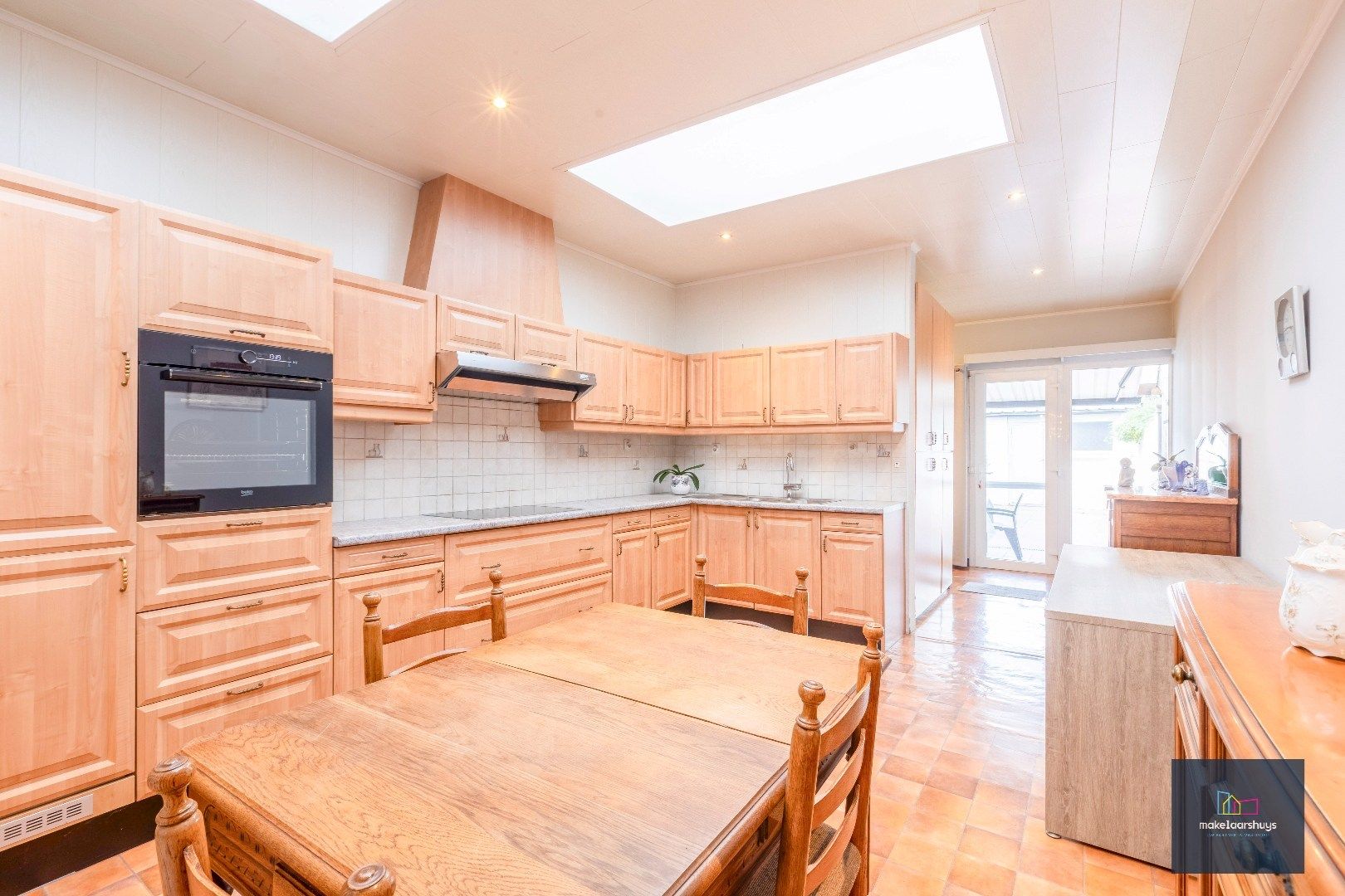 Charmante op te frissen rijwoning met ruime stadstuin  foto 8