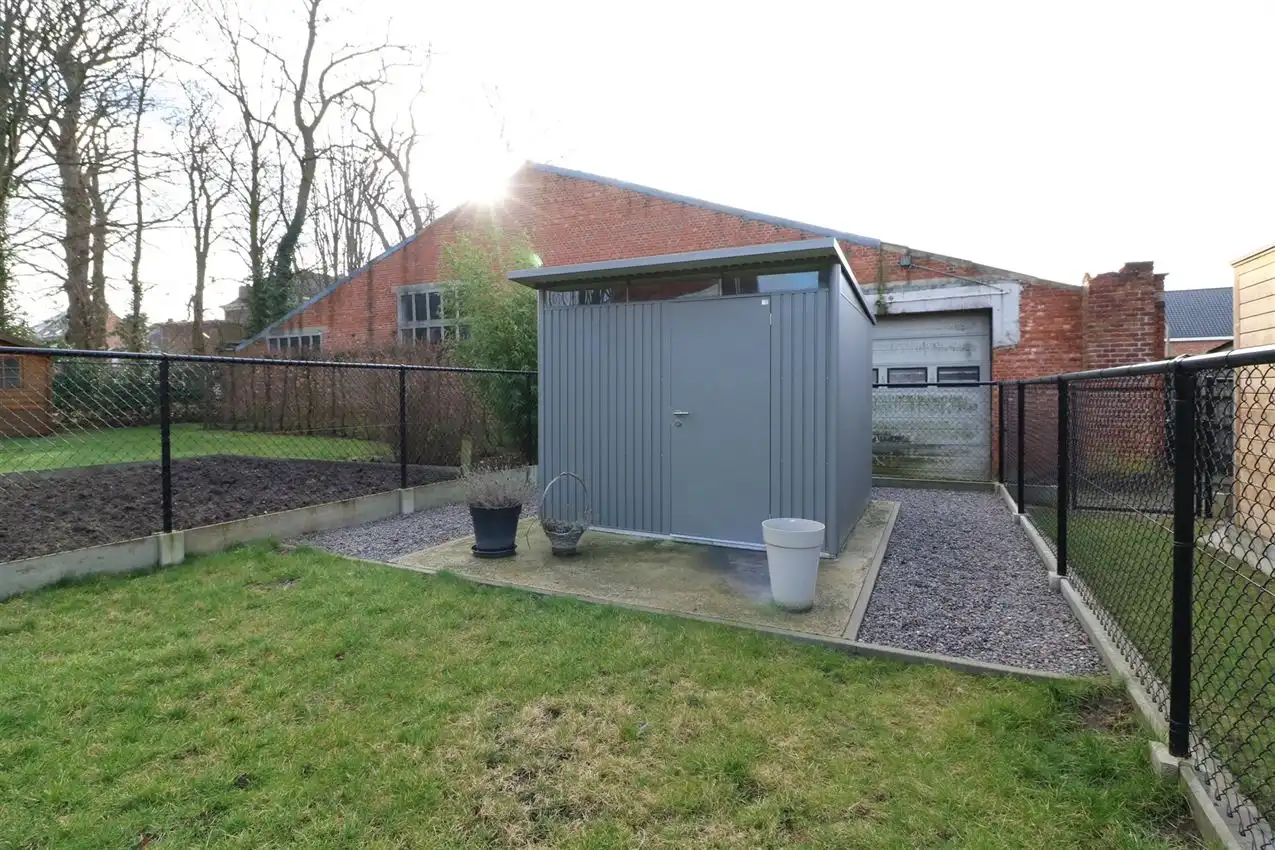 Gelijkvloers appartement met zuidgericht terras en tuintje, autostaanplaats foto 24