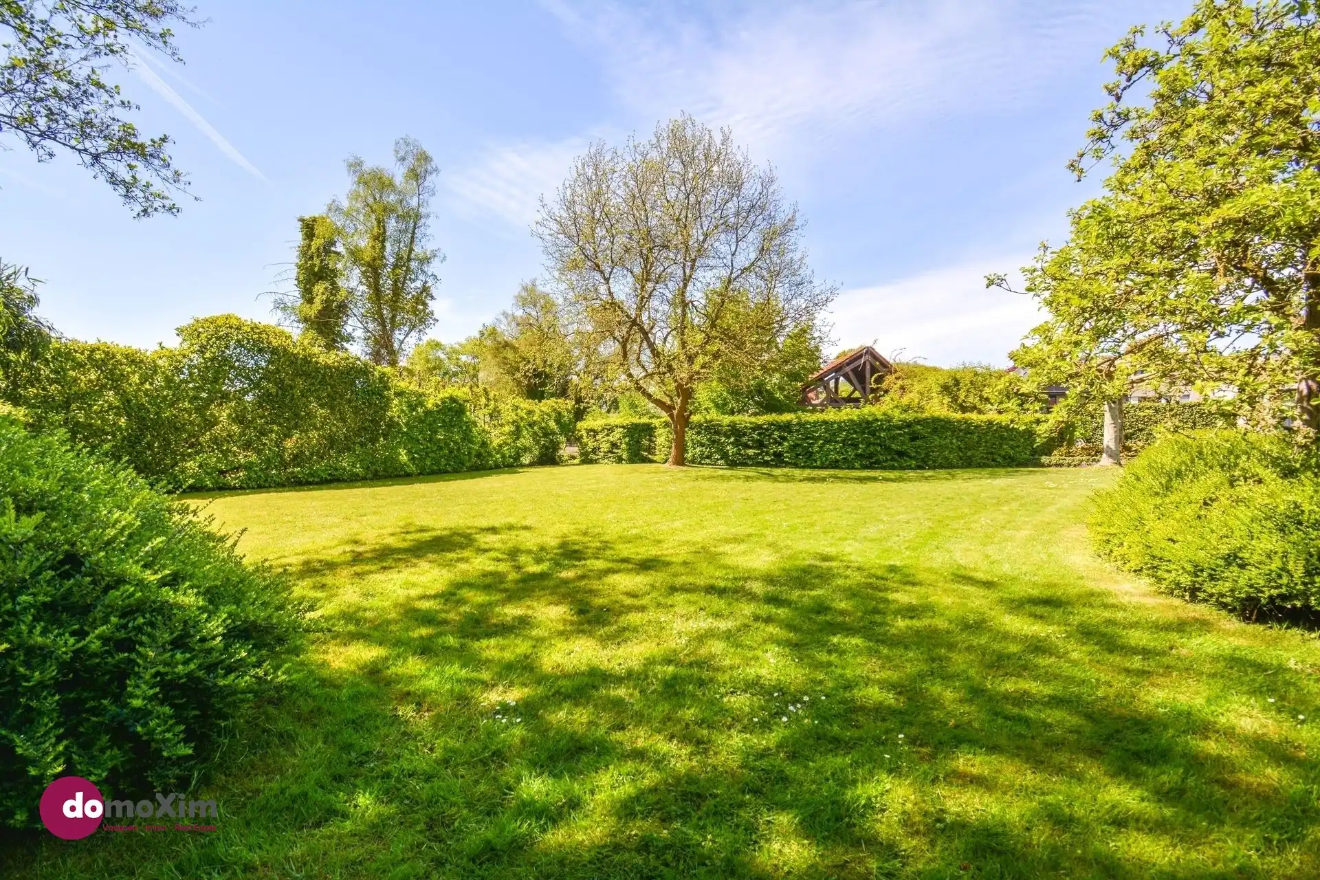 Charmante halfopen bebouwing met prachtige tuin en topligging aan de vaart foto 35