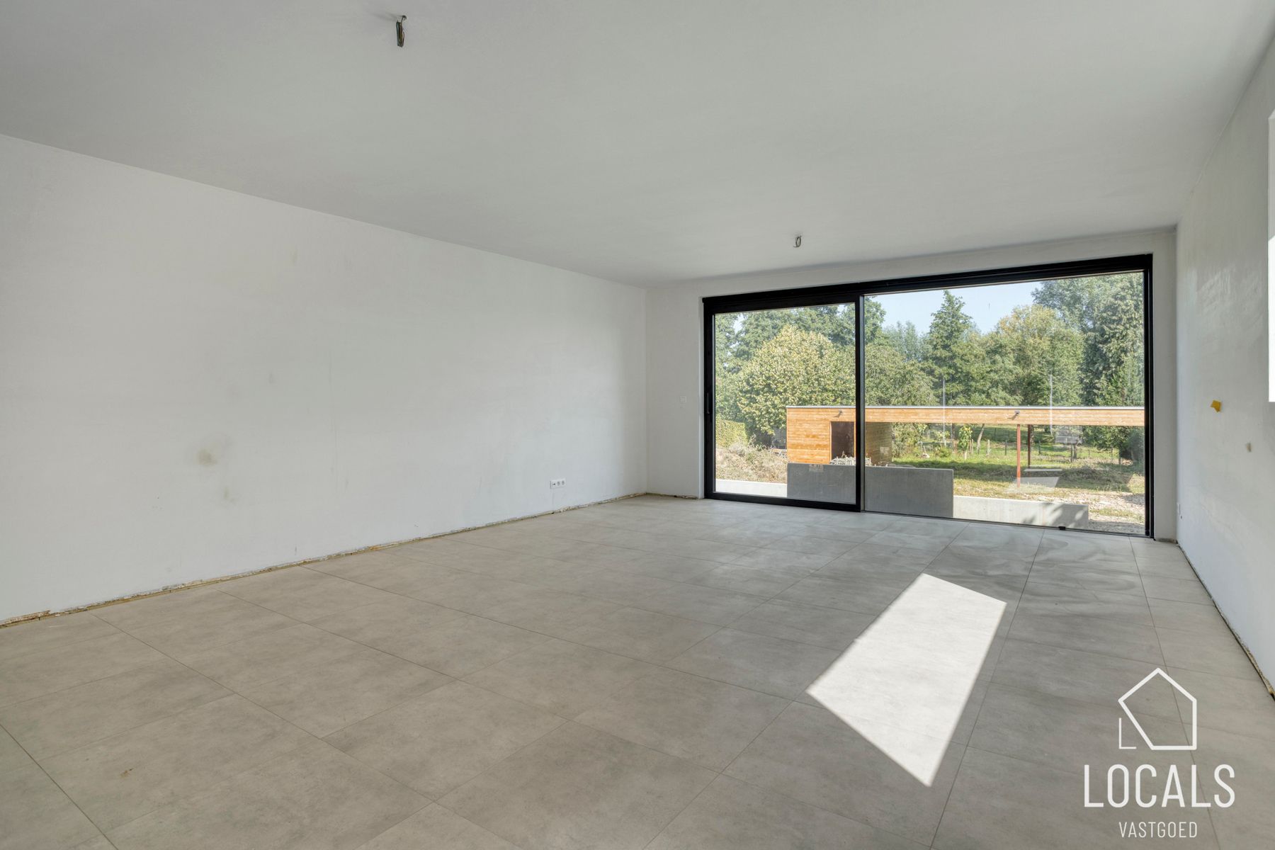 Ruime triplex-woning met 4 slaapkamers en 2 badkamers foto 5