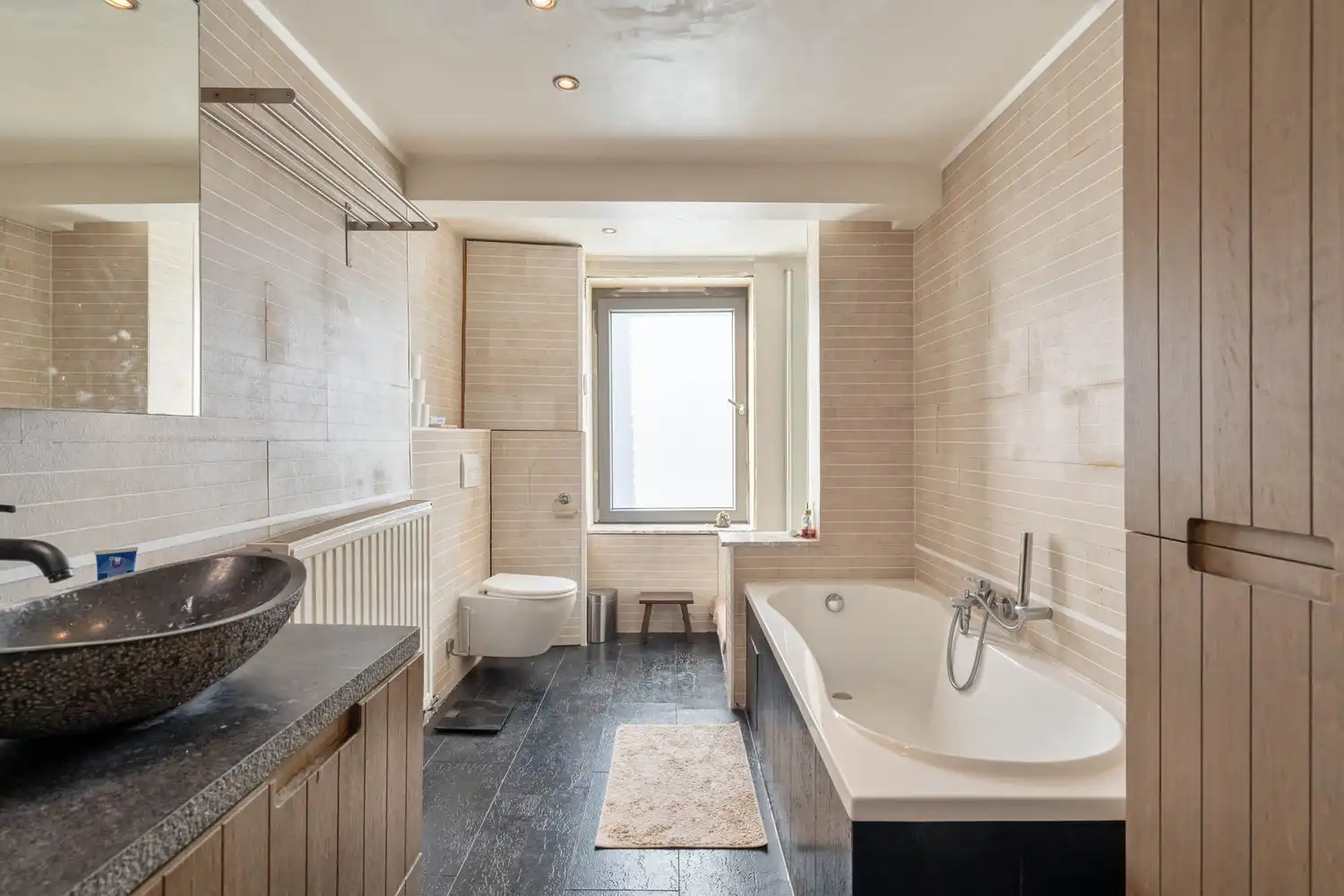 Goed gelegen halfopen bebouwing met 3 slaapkamers en een tuin met een poortje naar de straat te Wilsele! foto 19