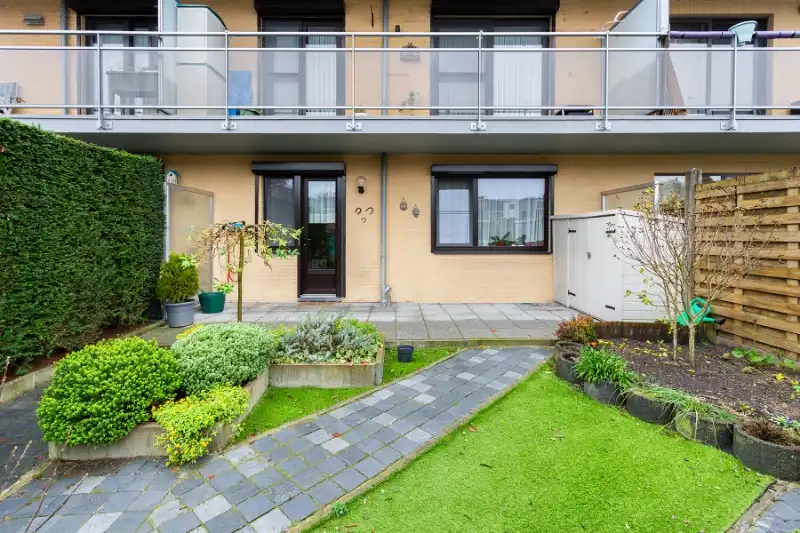 Gelijkvloers 2 slpk. appartement met tuin en garage foto 12