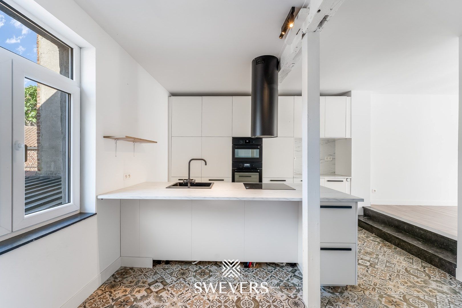 Ruim duplex appartement met knusse stadstuin in hartje Borgloon foto 13