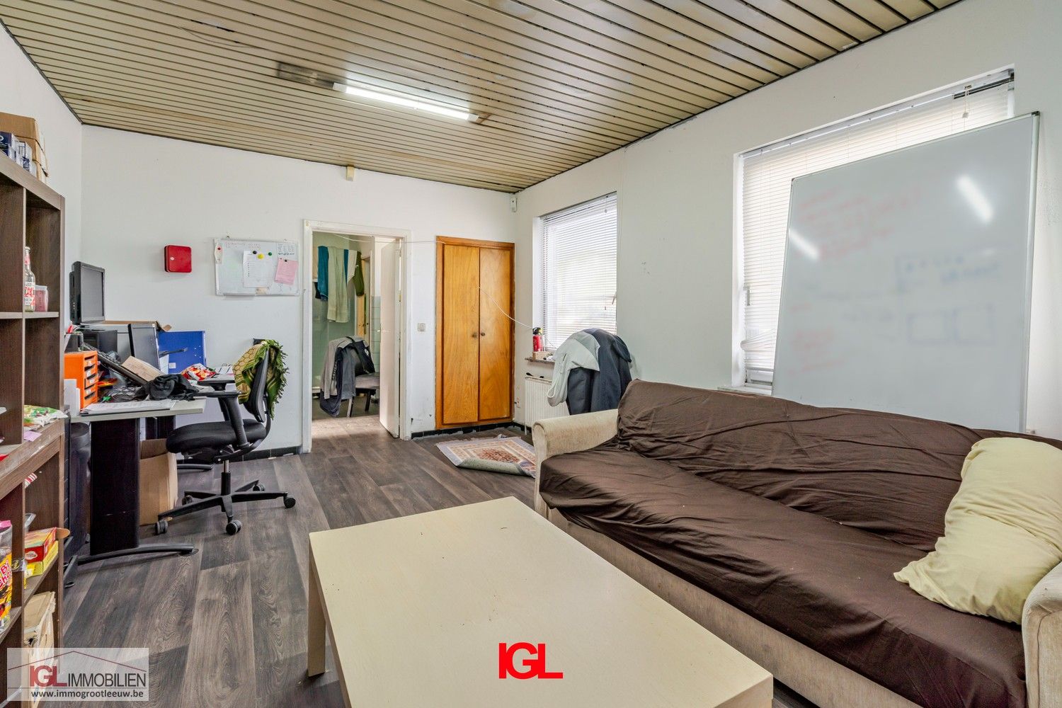 Handelspand met 2 handelsruimtes en 1 appartement te koop op AAA locatie foto 9