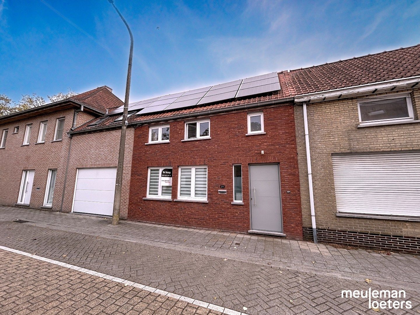 Instapklare woning met tuin en garage foto {{pictureIndex}}