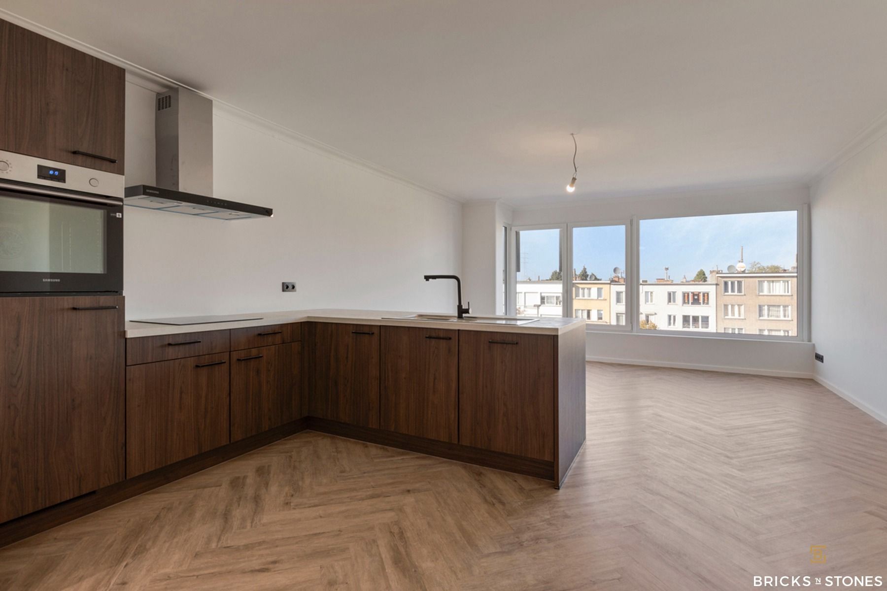 Gerenoveerd energiezuinig app met 3 slaapkamers en terras. foto 4