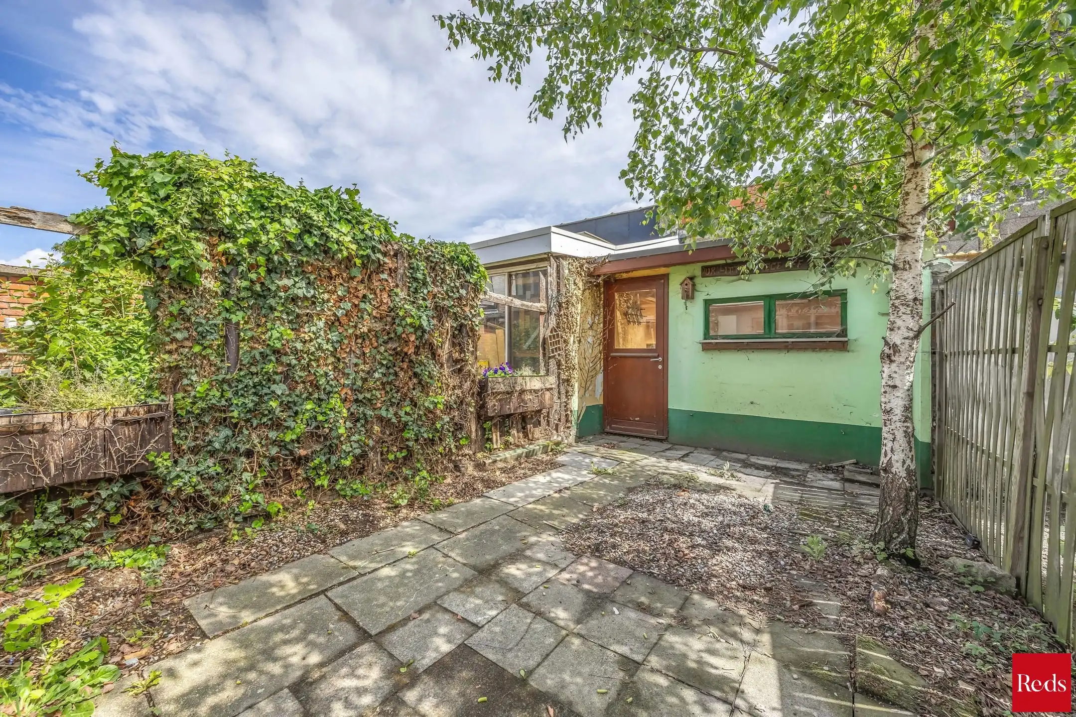 te renoveren woning met 3 ruime slaapkamers , garage en tuin foto 9