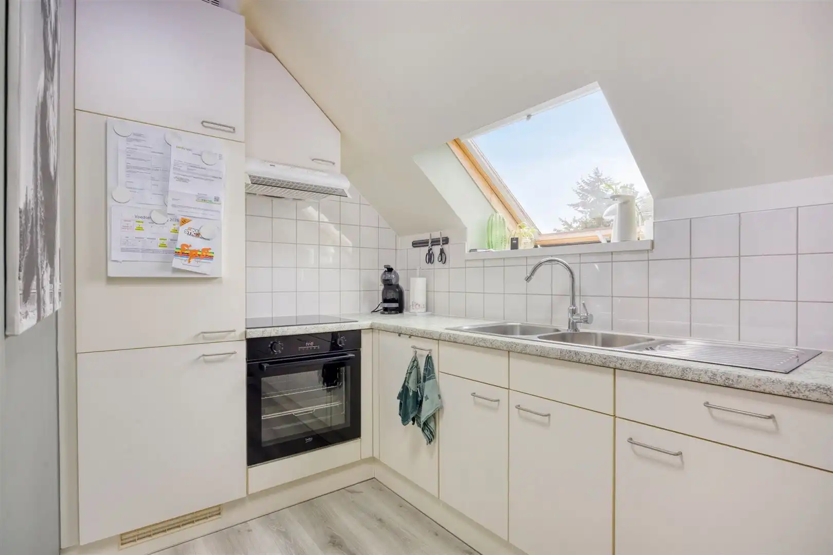 TE KOOP: Appartement met 1 slaapkamer, 2 terrassen en garage in Zonhoven! foto 7