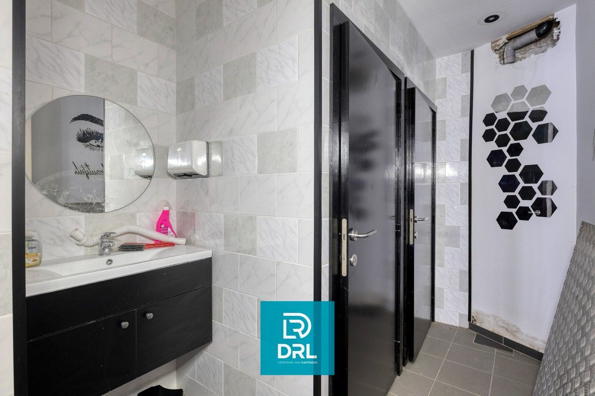 HANDELSHUIS met 2 APPARTEMENTEN te OOSTENDE foto 6