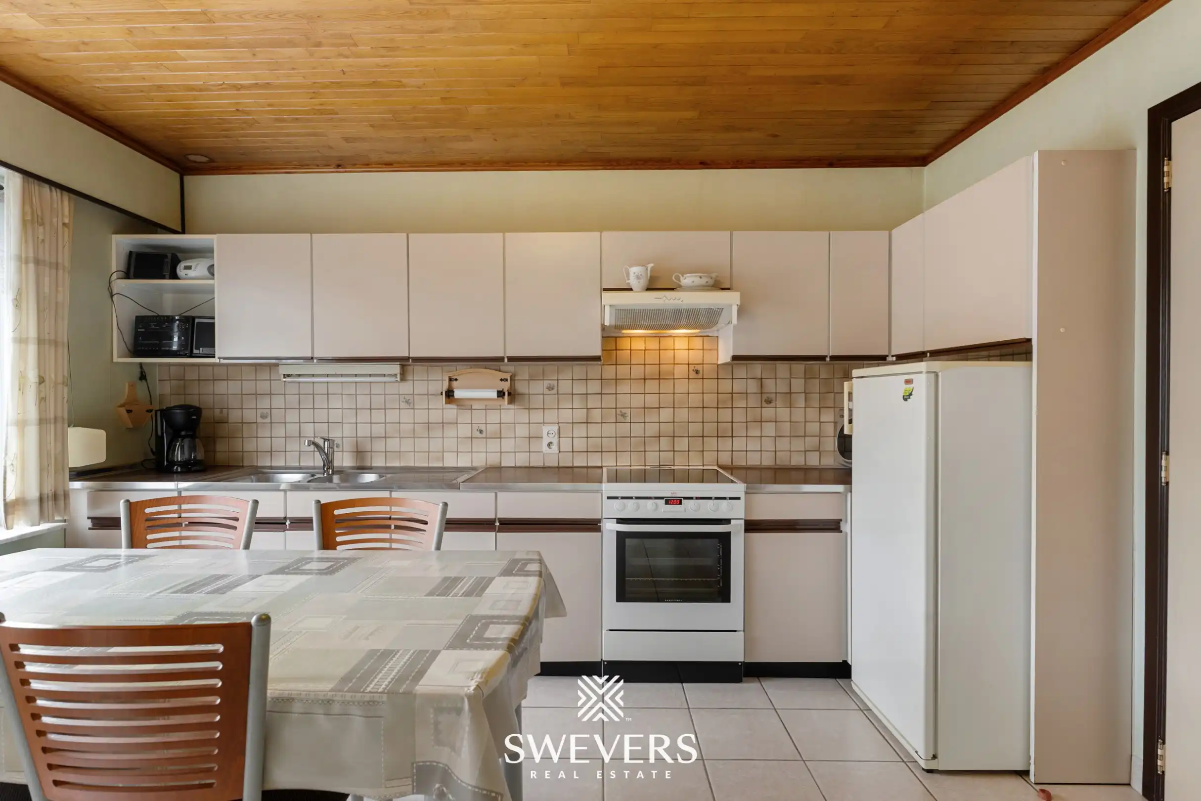 Charmante renovatiewoning met stevige structuur en veel potentieel in Koersel foto 10