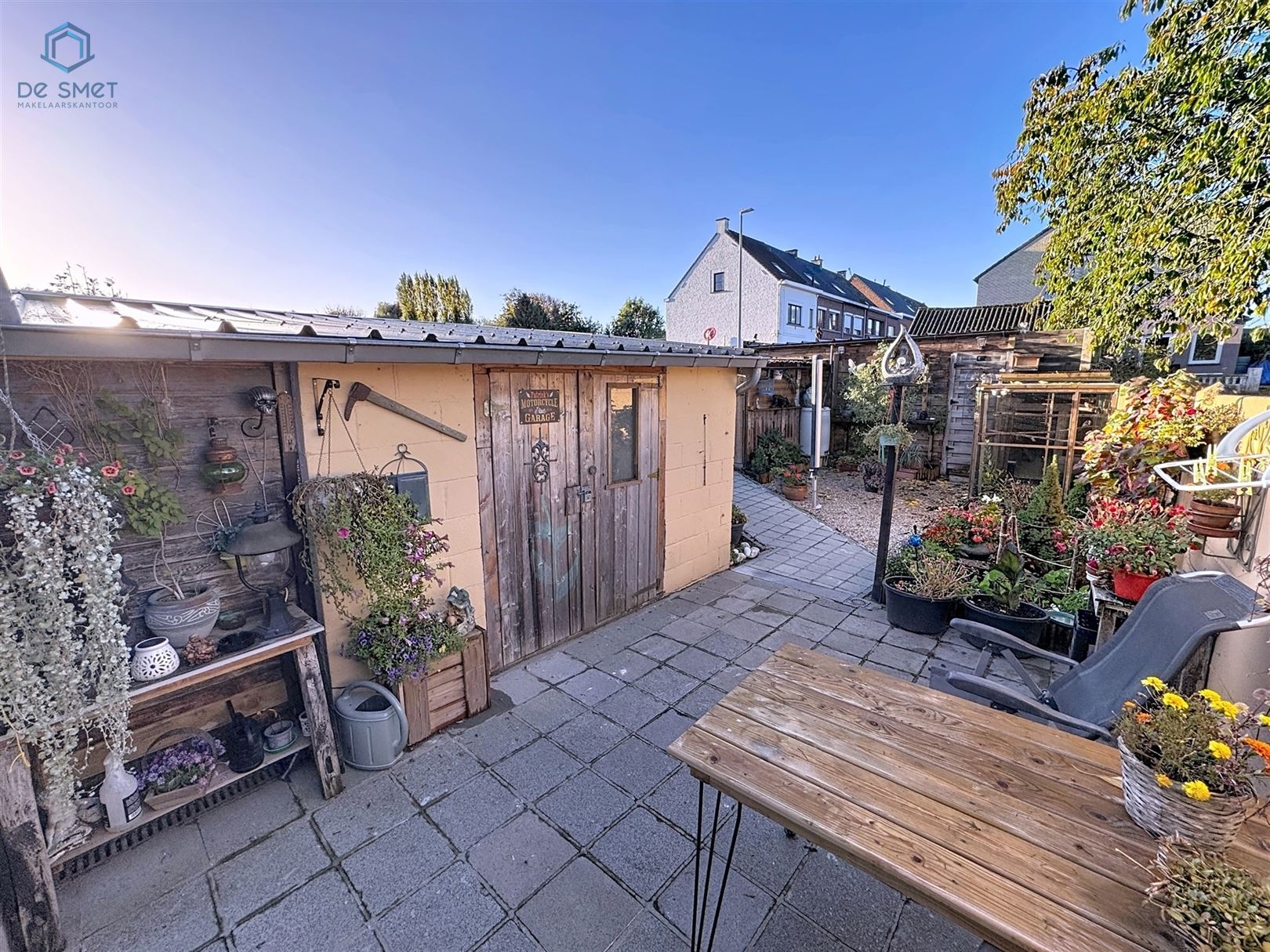 Instapklare woning met 3 slaapkamers, stadstuintje, berging en carport in rustige straat nabij centrum Brakel foto 11