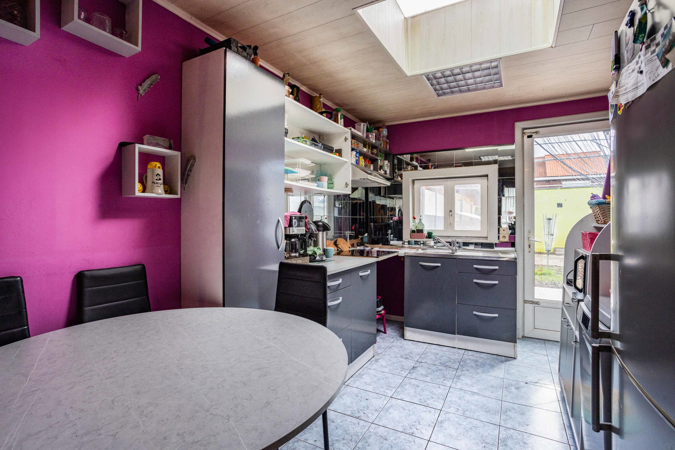 Instapklare rijwoning met garage op rustige locatie in Ronse foto 8