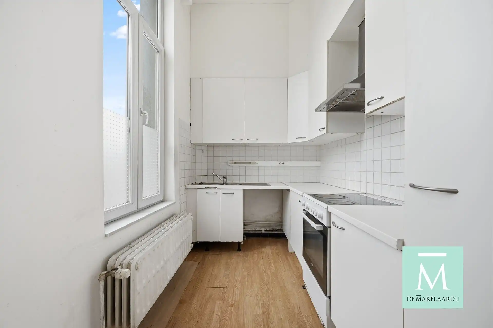 Op te frissen 2/3 slaapkamerappartement op strategische ligging! foto 4