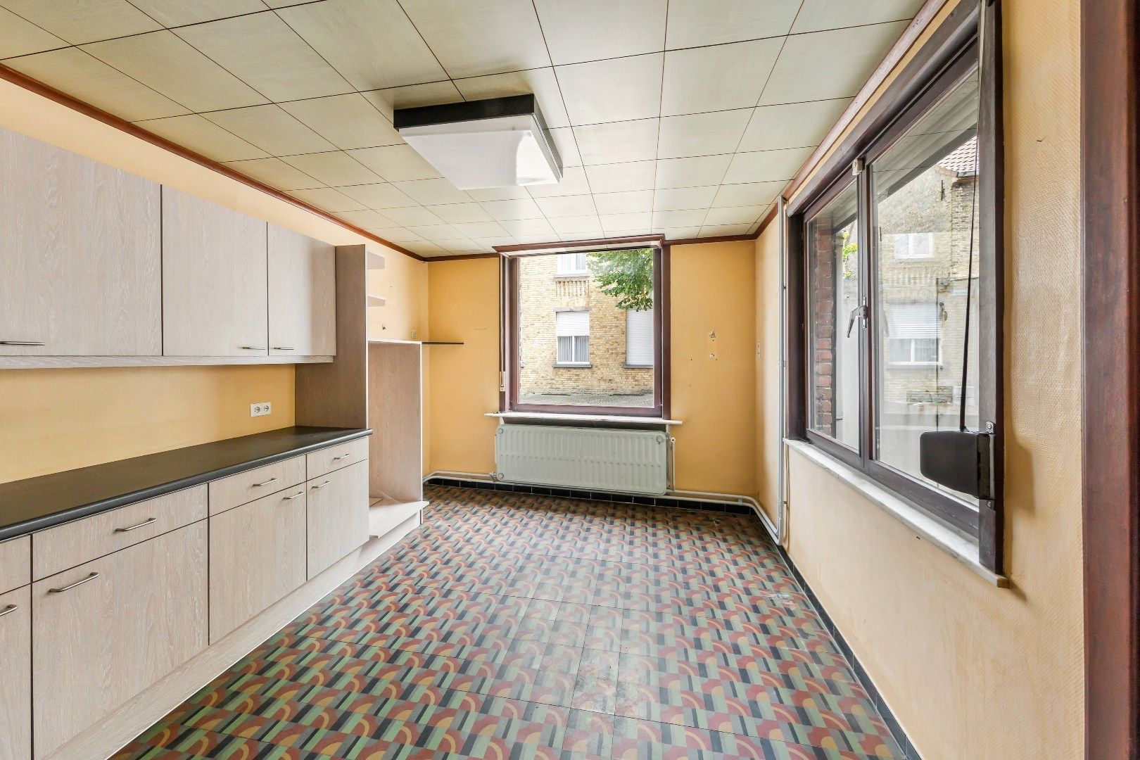 Gezellige stadswoning met 4 slaapkamers, ruime garage en koertje. foto 3