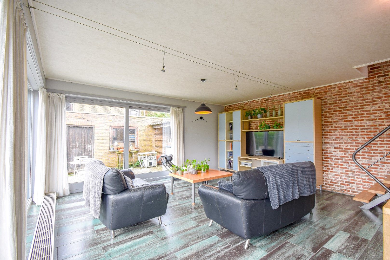 Rustig gelegen gezinswoning met 3 slaapkamers en garage foto 4