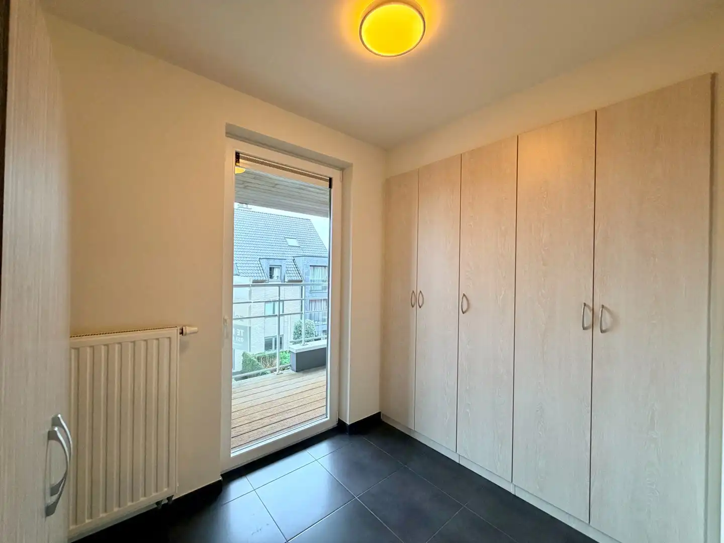 Instapklaar 2-slaapkamerappartement en terras op wandelafstand van centrum Tielt! foto 8