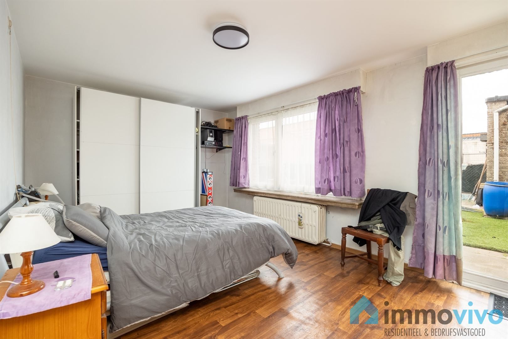 Ruim gelijkvloersappartement met 3 slpk's en koer foto 10