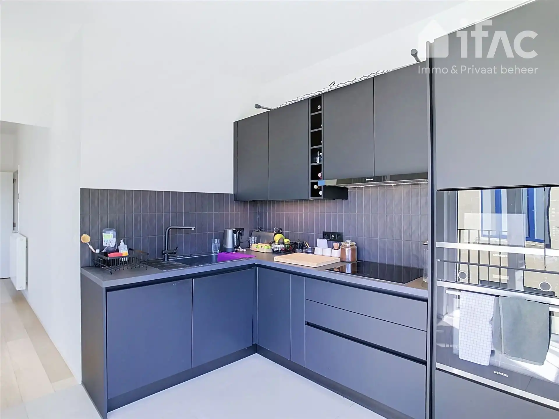 Prachtig afgewerkt duplex appartement met garage foto 11