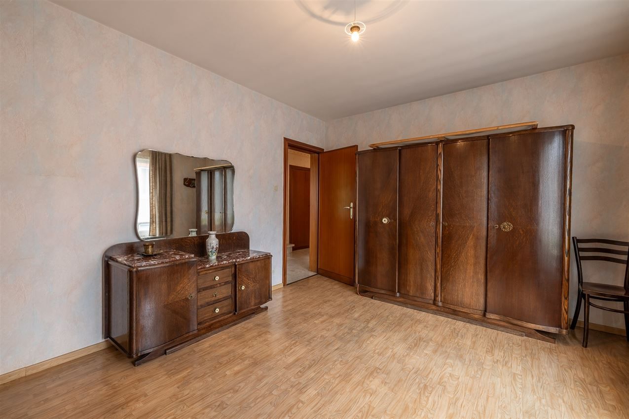 Te renoveren woning met 4 slk. in het hart van Averbode foto 15