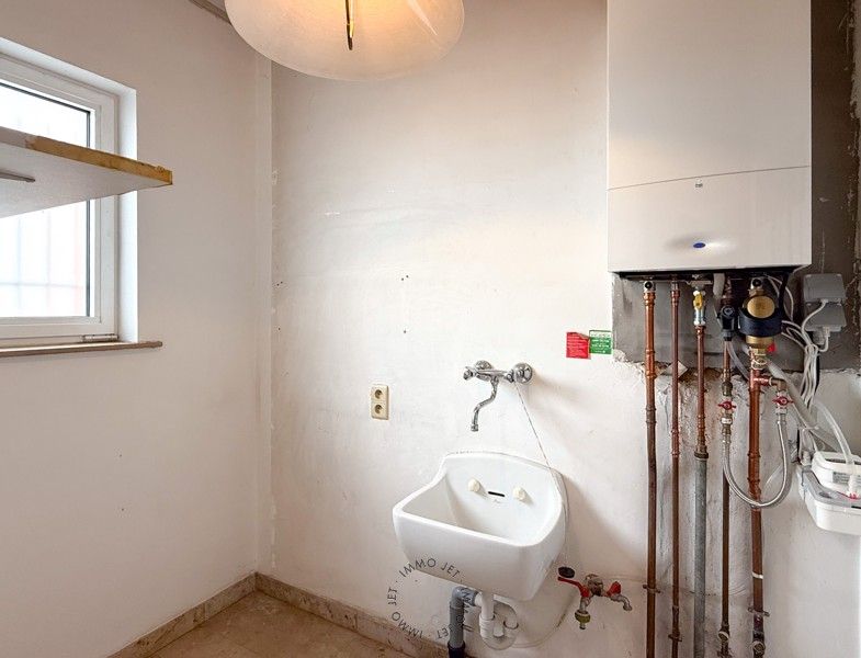 Ruim duplex appartement met 2 slaapkamers nabij centrum Beveren foto 9