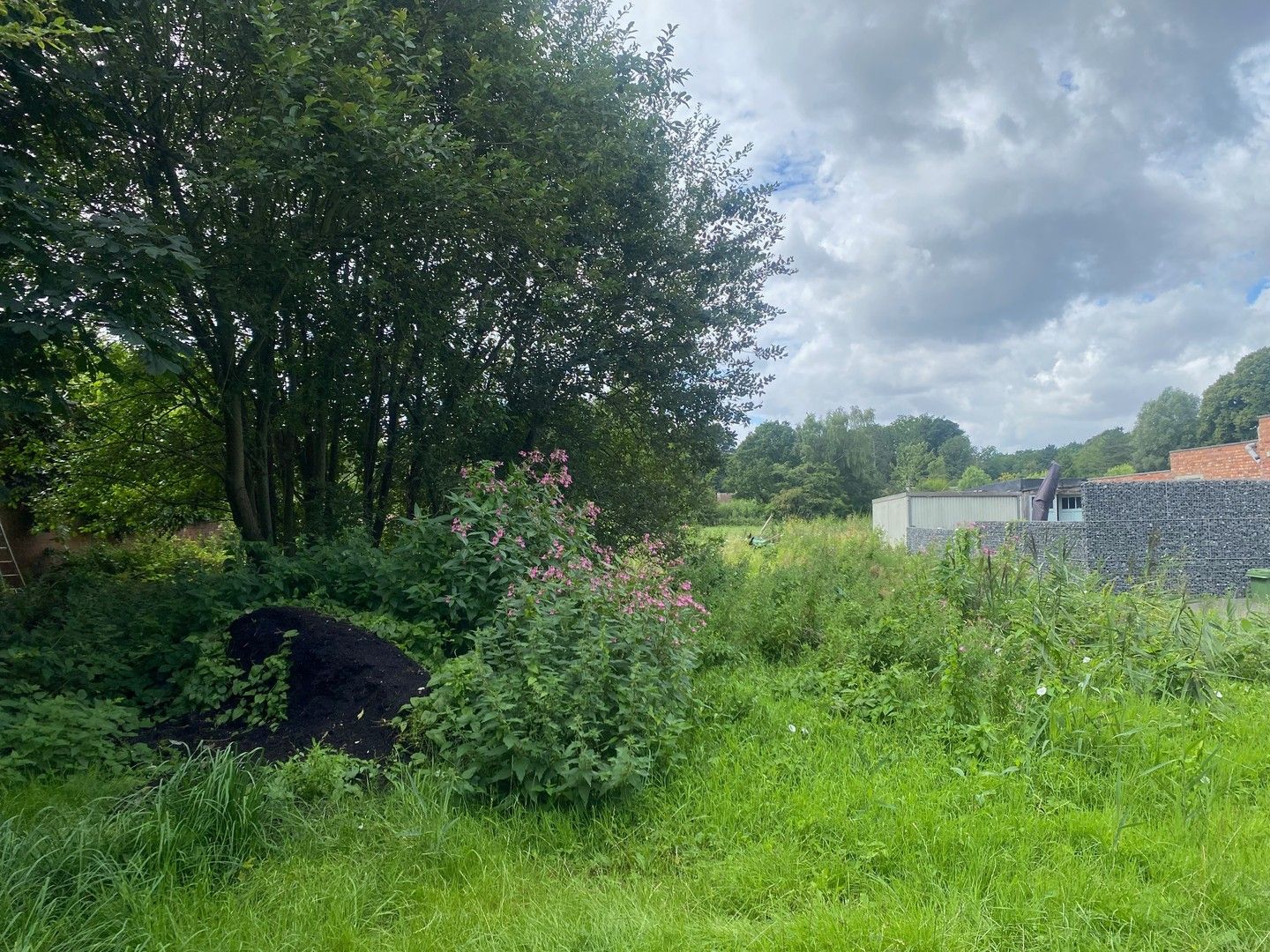 Rustig gelegen & zuid-west georiënteerde bouwgrond met uitzicht op groen. foto 7