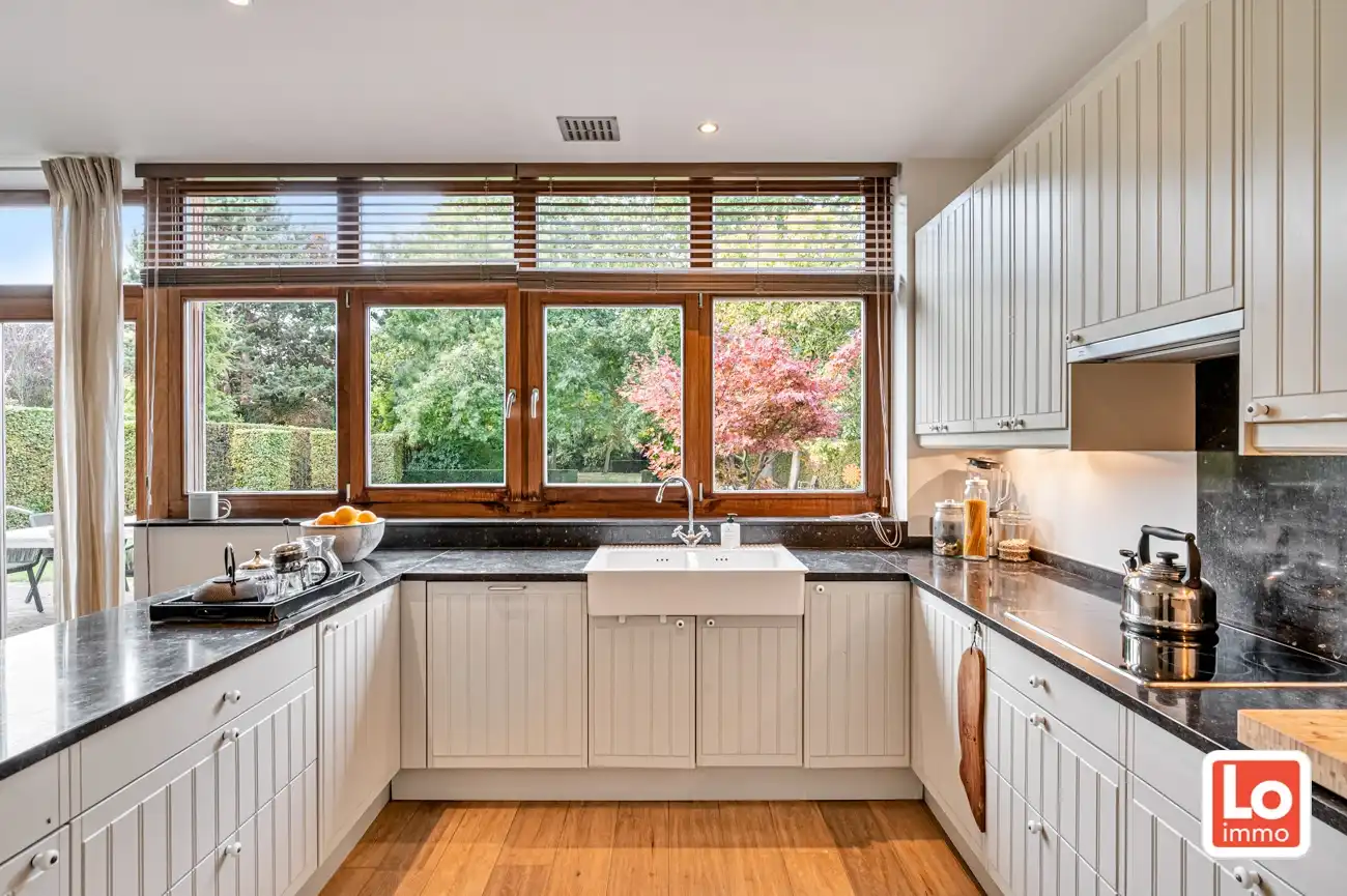 VERKOCHT! Charmante alleenstaande woning met inpandige garage en grote tuin op een rustige, groene locatie nabij het centrum van Beervelde! foto 14