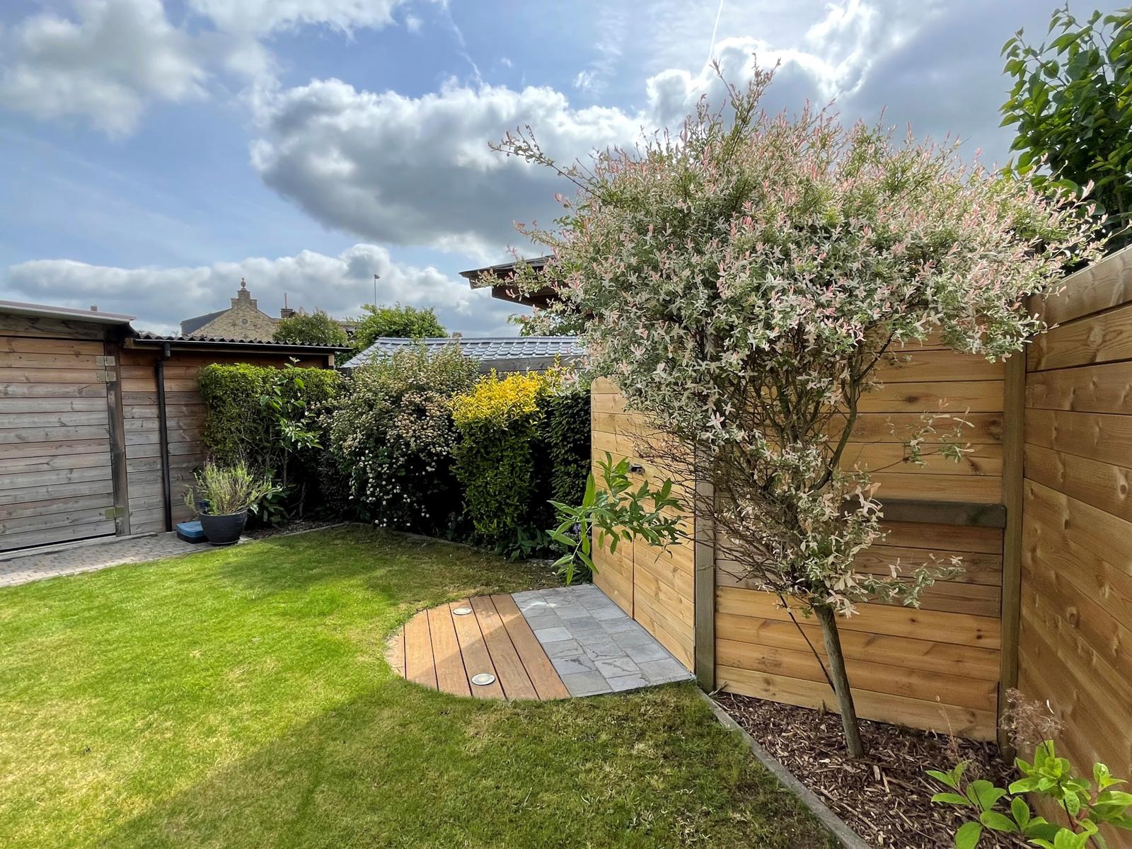 Instapklare woning met oprit, garage en zuidgerichte tuin foto 16